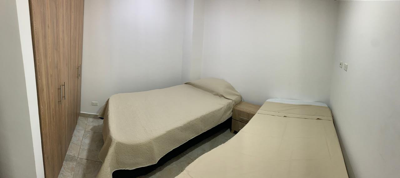 Bright primary bedroom in Calarcá apartment
